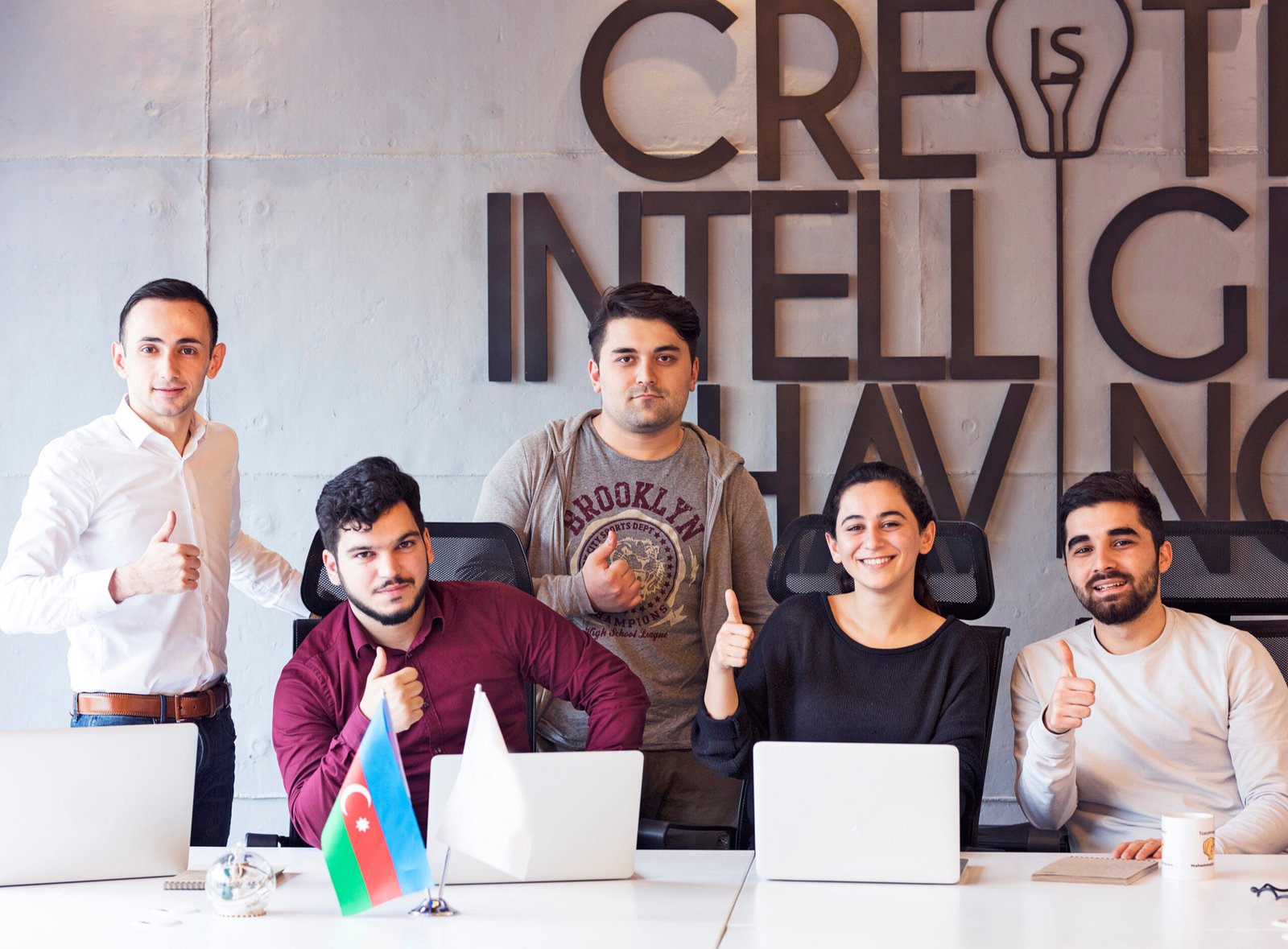 happy-motivated-colleagues-office